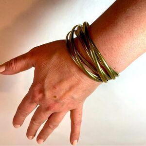 Layered gold bangles 